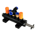 Pneumatic manifold with multiple ports and a control lever.