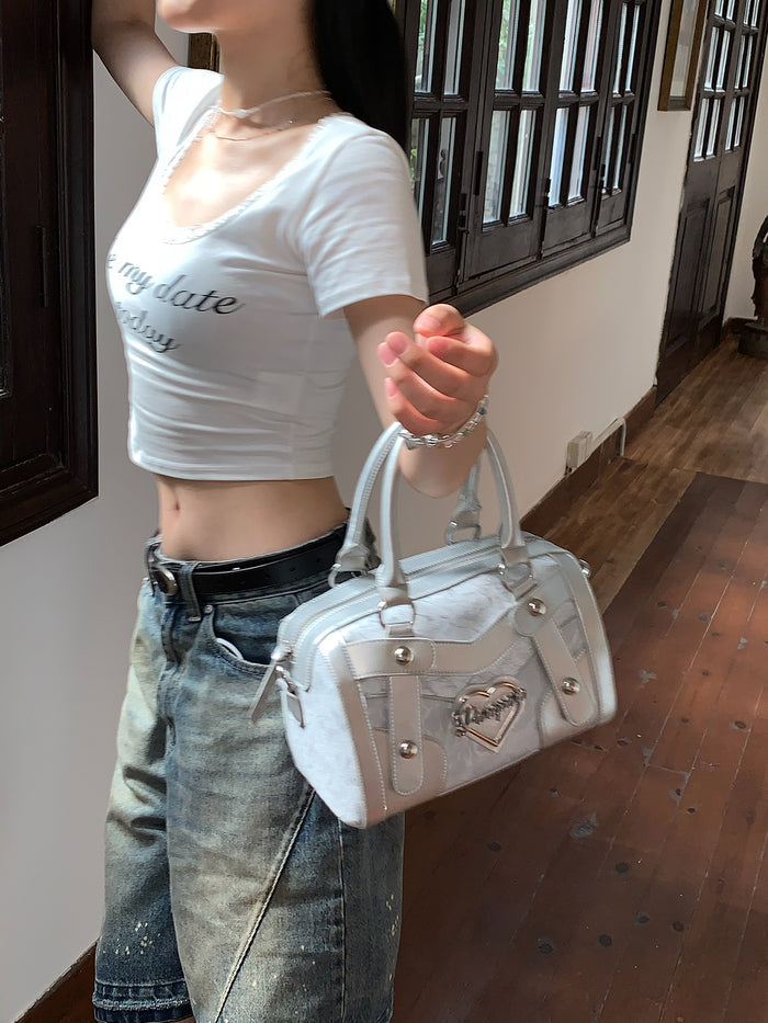 Chic Silver Metallic Handbag with Heart Emblem