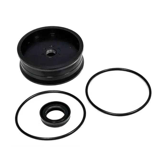 Disassembled black plastic Coats Tire Changer cylinder seal kit with O-rings for APX80 & APX90