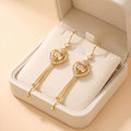 ✨ Elegantes pendientes con borlas en forma de corazón-ES