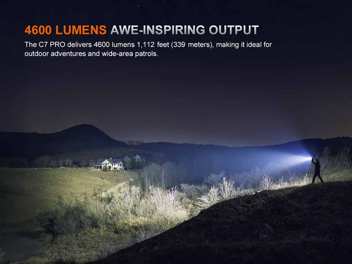 Person using the Fenix C7 Pro in a dark landscape with text about 4600 lumens output
