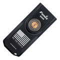 Black flashlight with 'Fenix' branding and 'We the People' flag design on a white background