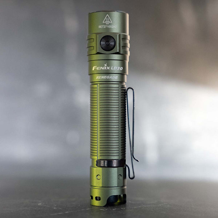 Fenix LD30 RENEGADE standing on the tail on a gray background