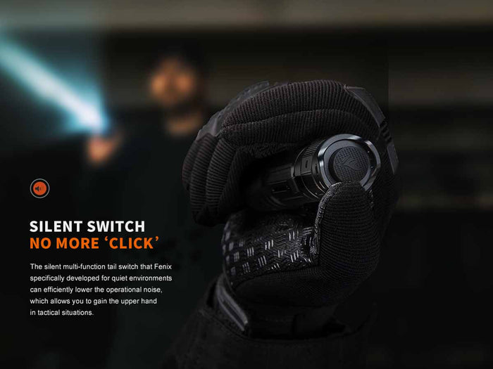 Hand holding Fenix PD32R rechargeable flashlight with text about silent tail switch
