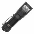 A black tactical flashlight with a metal clip, featuring an engraved American flag graphic with an eagle emblem on the head, shown against a plain white background.