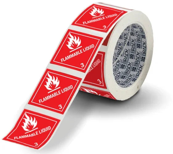 Red flammable liquid warning labels with flame symbol, ideal for gas station safety signage and hazard identification.