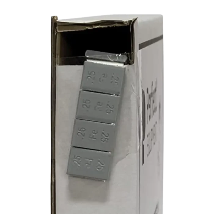 Silver 25.0 16v low profile lead-free steel capacitors stacked in box