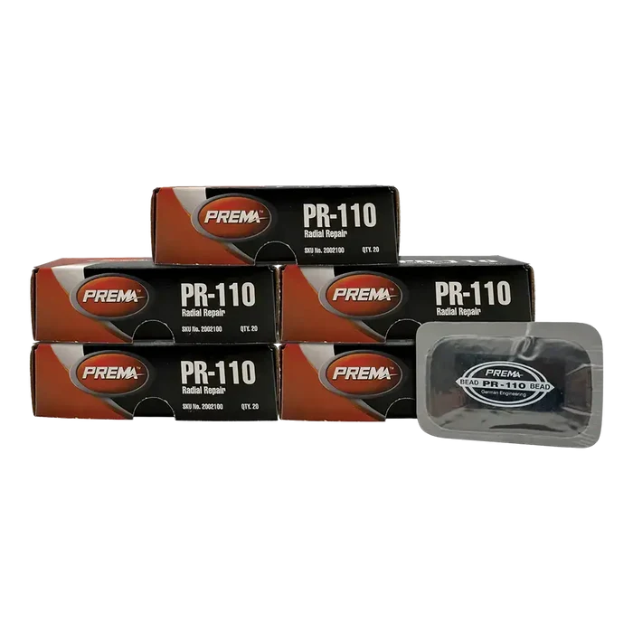 Image of Prema PR-110 radial tire patches boxes and a single patch for tire repairs
