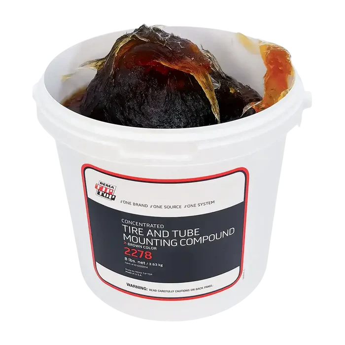 White bucket of Rema 2278 concentrated tire mounting compound for mounting rubber tires