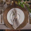 Tobacco Gingham Linen Dinner Napkins, Set of 4 on a table at Addison West